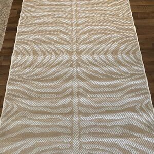 Korhani 52" x 79” indoor/outdoor area rug.